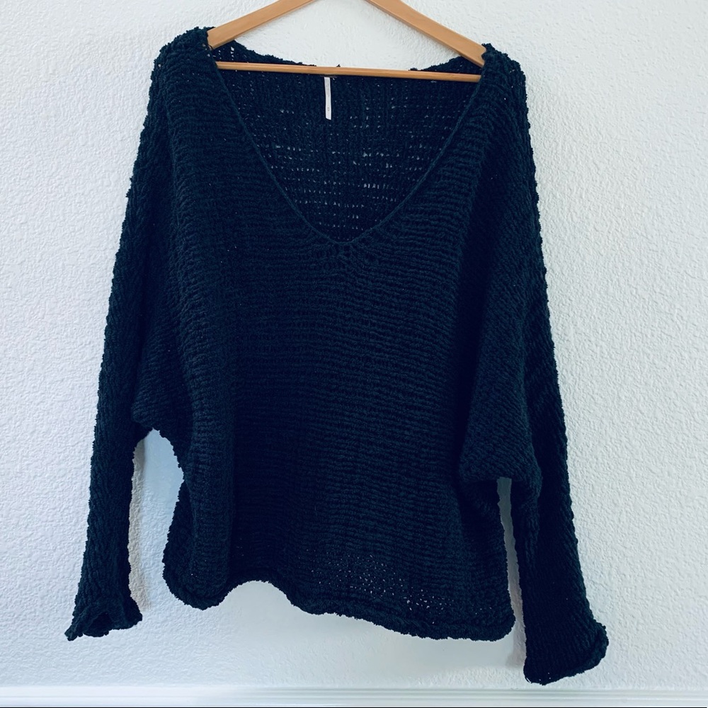 Free People black knit pull over sweater medium.